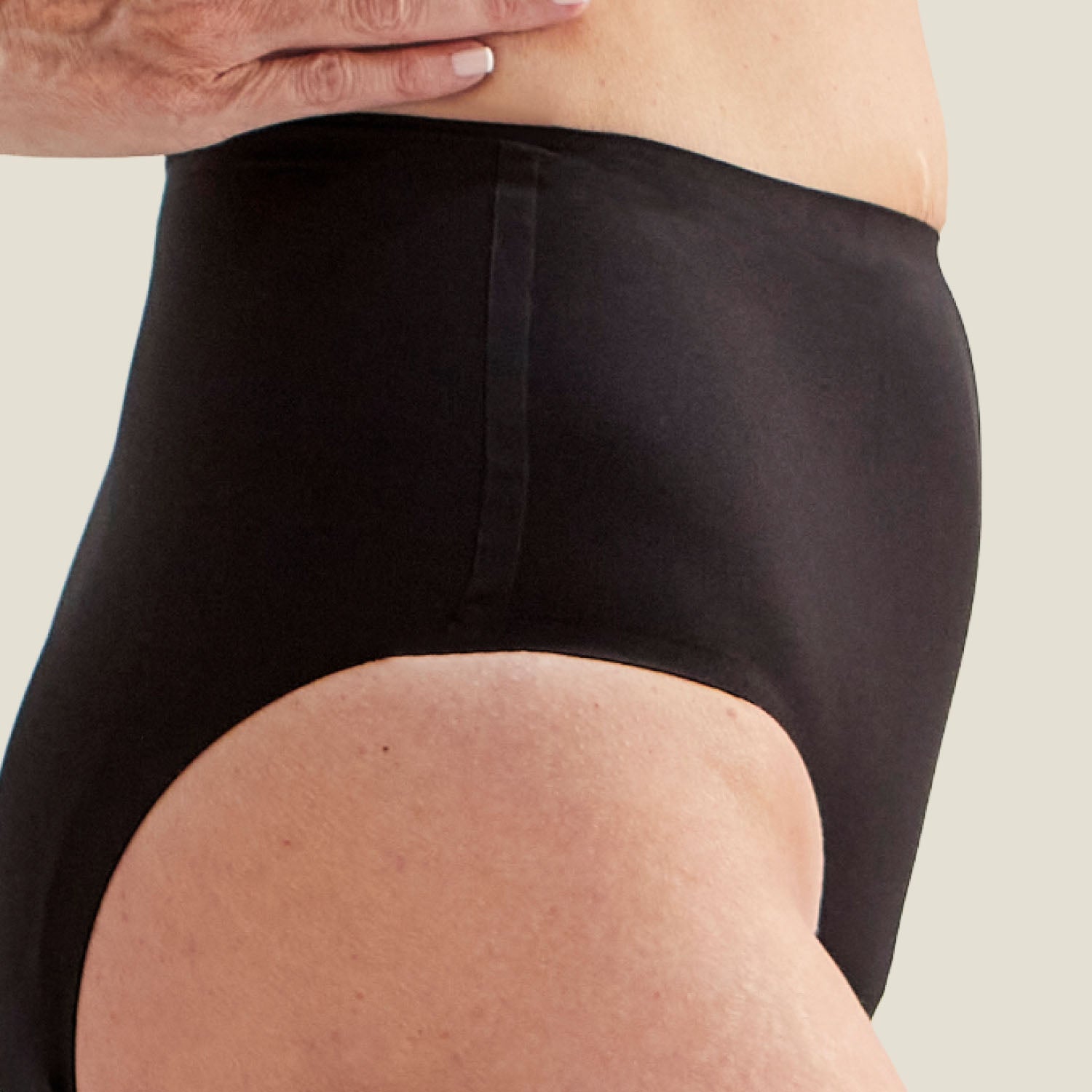 Detail shot of the side stitching and fabric texture of the Drytech™ High Waist Incontinence Brief, designed for comfort and flexibility.
