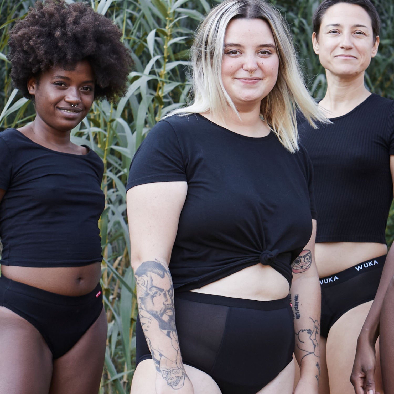 Diverse group of women outdoors wearing WUKA period underwear, including the Ultimate™ High Waist style for super heavy flow, celebrating body positivity and comfort.