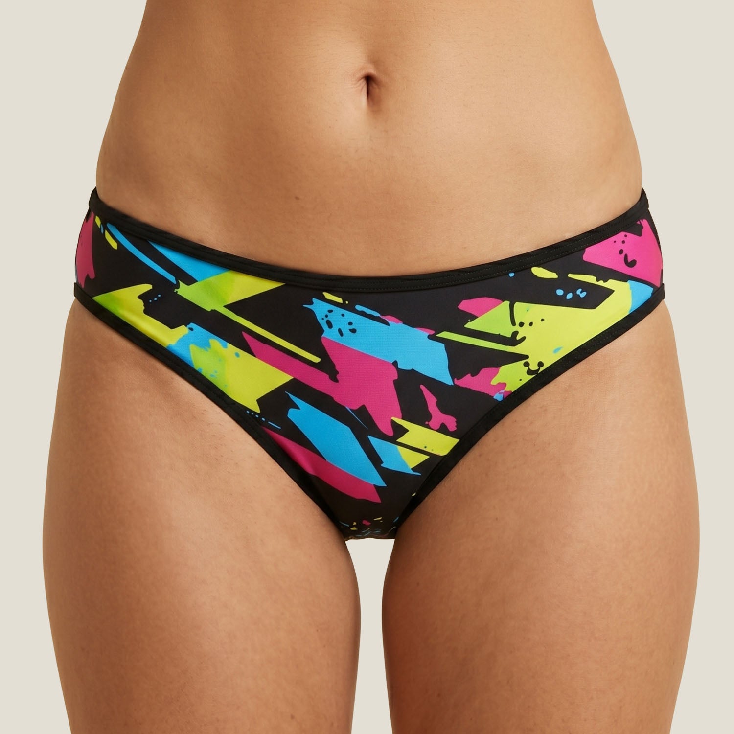 Teen swimmer wearing WUKA Lunafly Competition Bikini bottoms, front view — leakproof period bikini