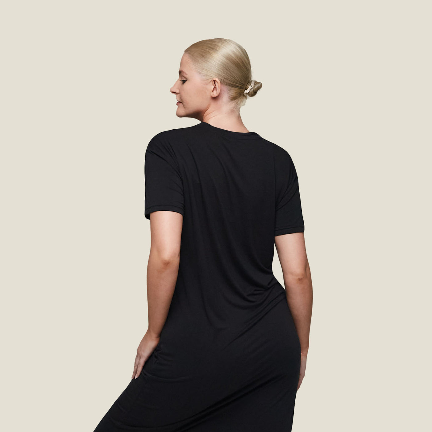 Rear view of WUKA Pyjama Jersey T-Shirt Dress, highlighting relaxed fit and drape of menopause cooling nightwear.