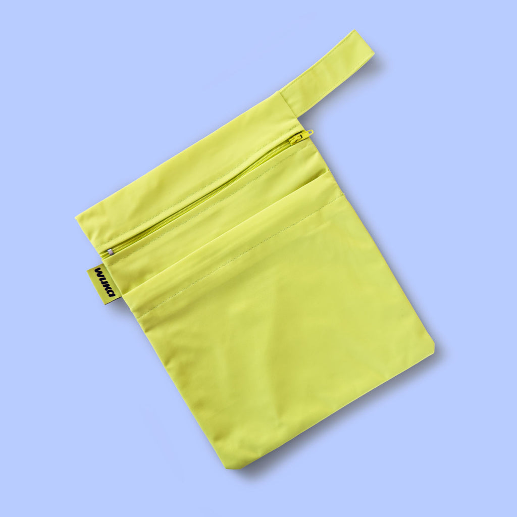 Lime punch silicone swim cap included in the WUKA Lunafly Bikini period swim kit