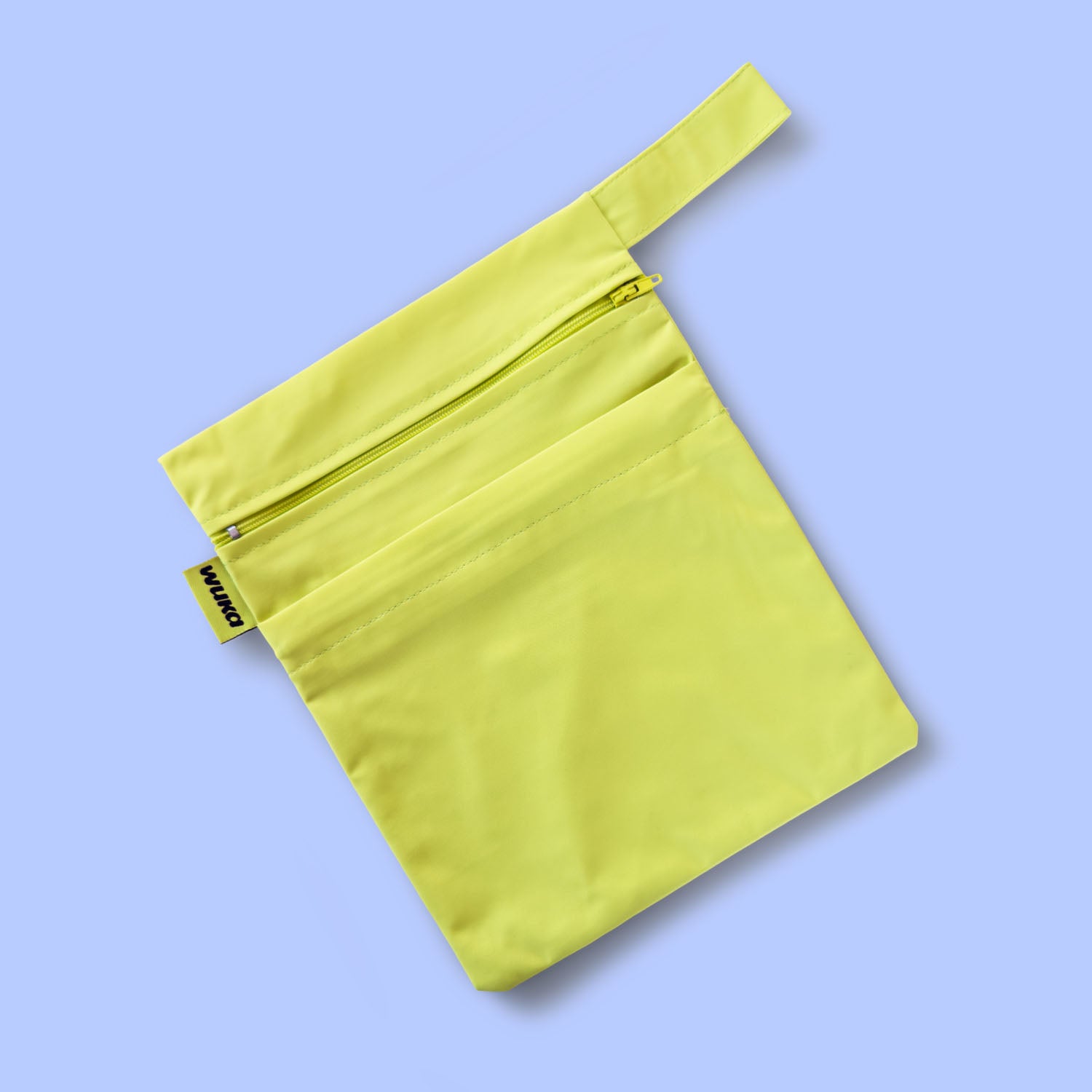 Waterproof changing bag included in the WUKA Lunafly Racerback period swim kit