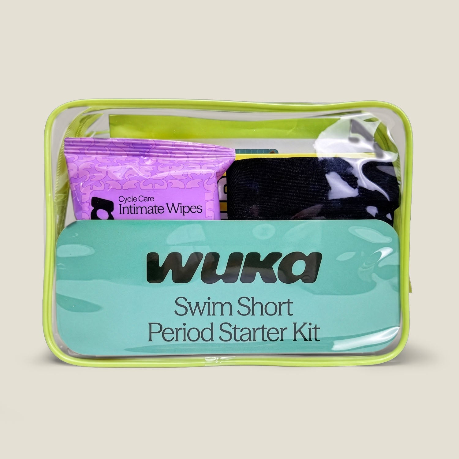Wuka swim short period starter kit with clear pouch on beige background
